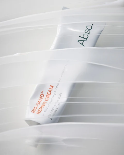 Abso Bio-Band Repair Cream tube in the brand’s product photography